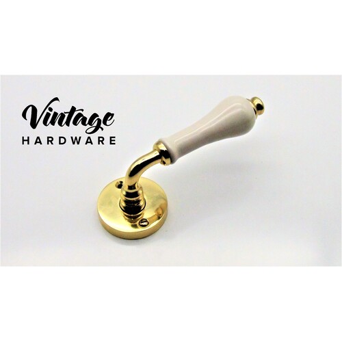 POLISHED BRASS CHATEAU WITH IVORY PORCELAIN LEVER