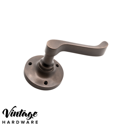 ANTIQUE BRASS VICTORIAN LEVER ON ROUND ROSE